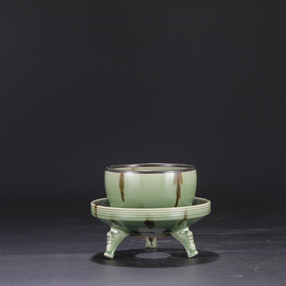 A Southern Song Dynasty Longquan celadon-glazed porcelain vessel with a silver rim and large floral (1 of 7)