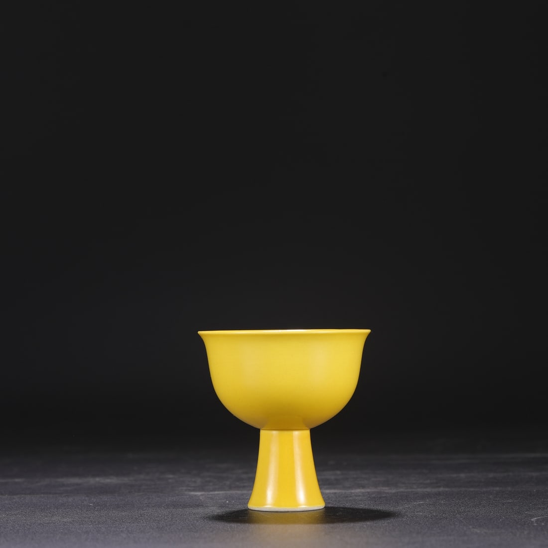 A Ming Dynasty Zhengde period (1260-1275) high-footed cup with a delicate yellow glaze, (1 of 6)