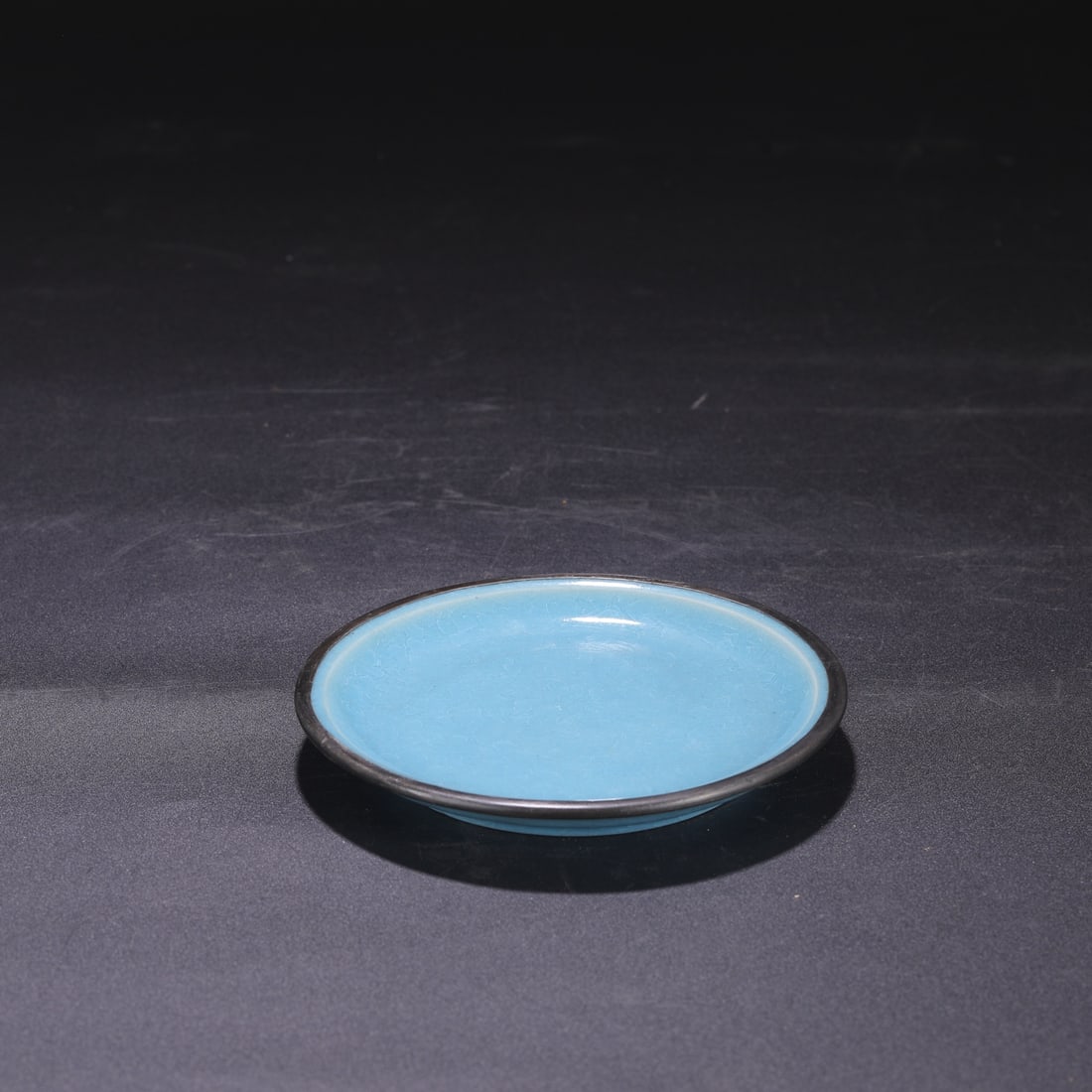 A Northern Song Dynasty Ru ware sky-blue glazed dish with ice-crack pattern and silver rim, formerly (1 of 6)
