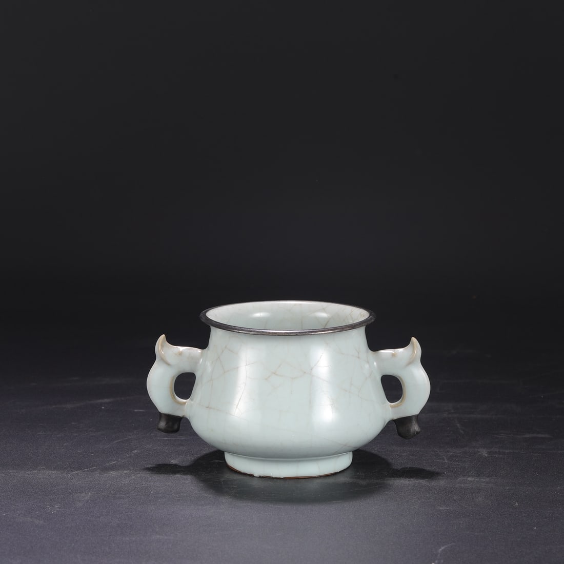 A Southern Song Dynasty official kiln celadon elephant-ear censer/wash basin, formerly in the (1 of 7)