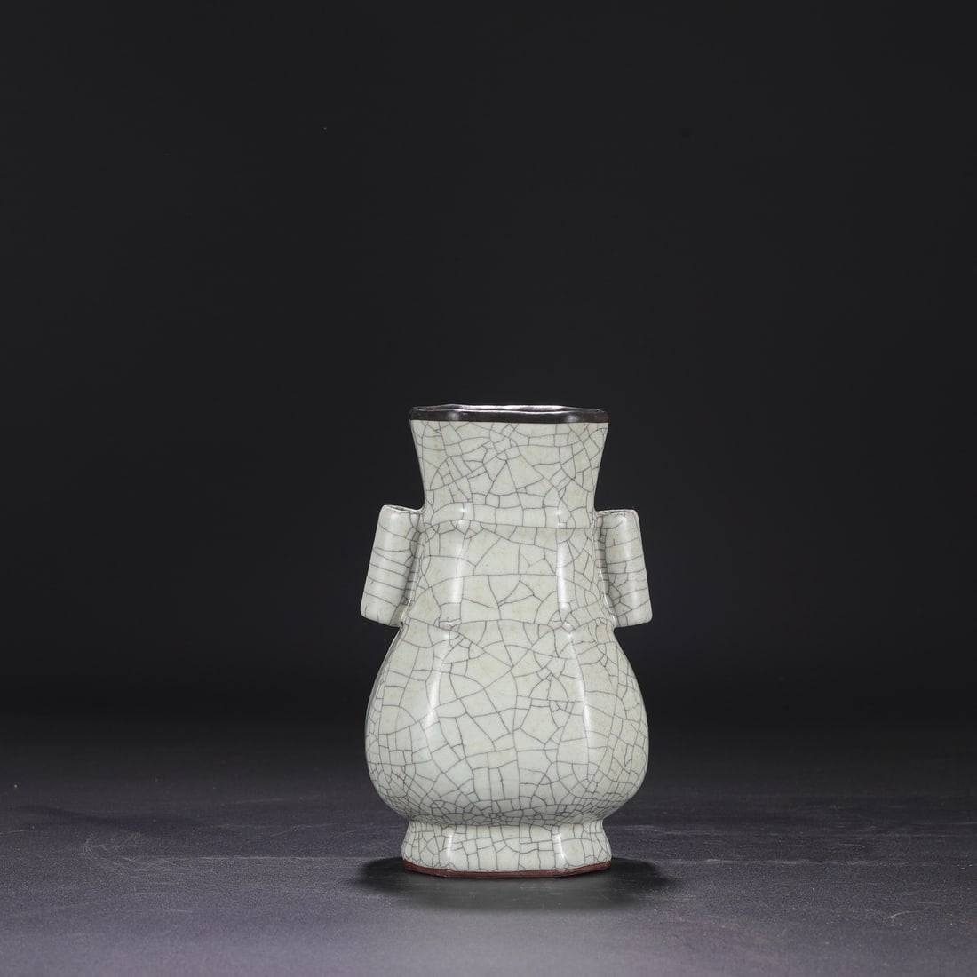 A Southern Song Dynasty official kiln celadon vase with a silver rim, used in the imperial court,: Dimensions: Height 21.5 cm, Mouth diameter 9 cm, Belly diameter 12.5 cm.