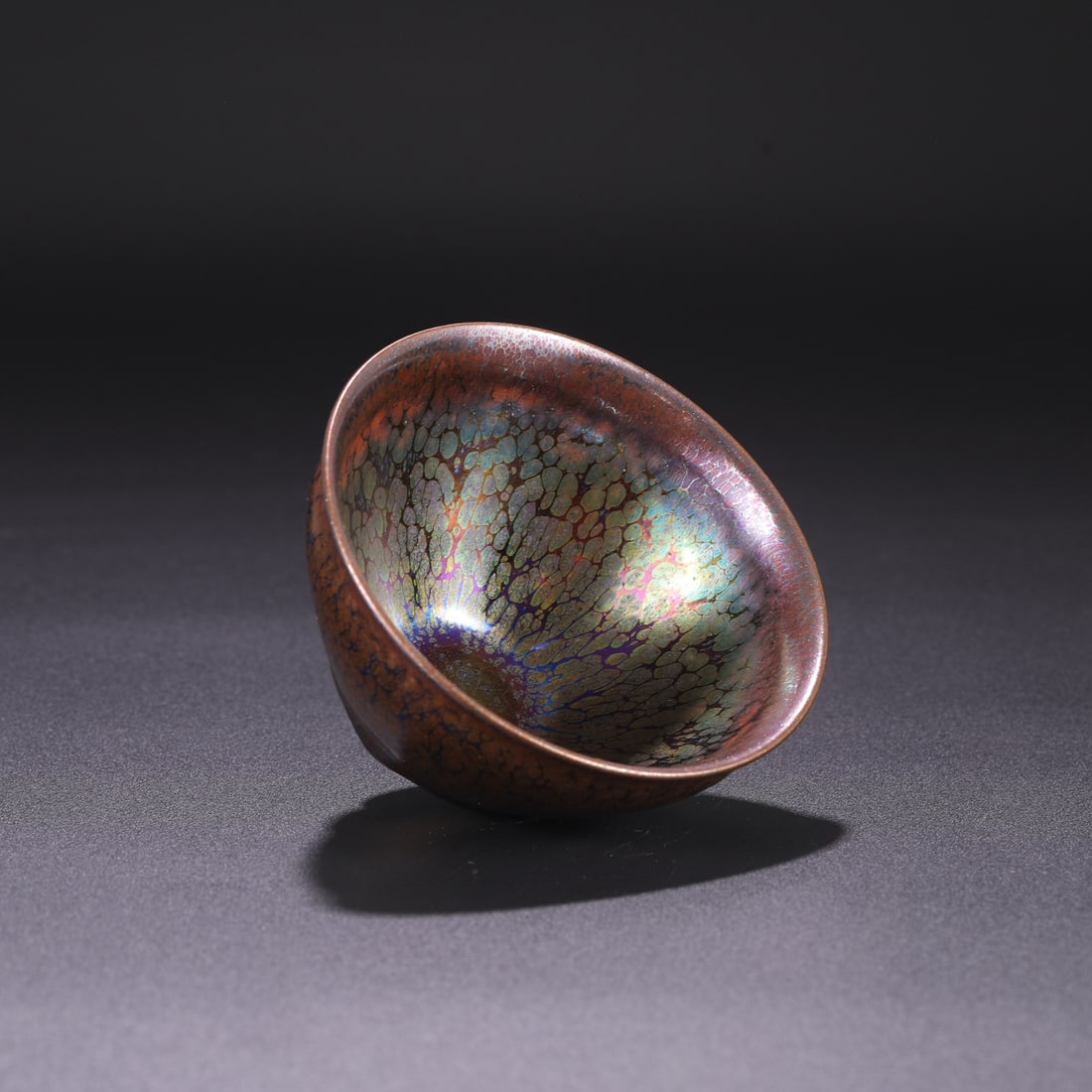 The Northern Song Dynasty Jian ware polychrome oil-spot tea bowl, formerly in the collection,: height and 12.5 cm in diameter.