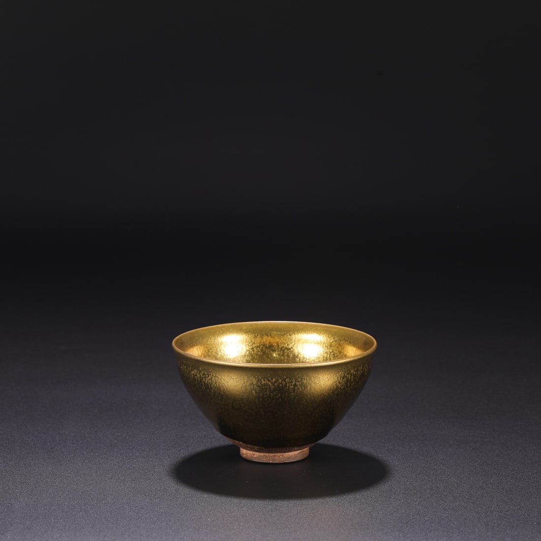 A Northern Song Dynasty Jian ware gold-glazed oil-spot tea bowl from a collection. (1 of 5)