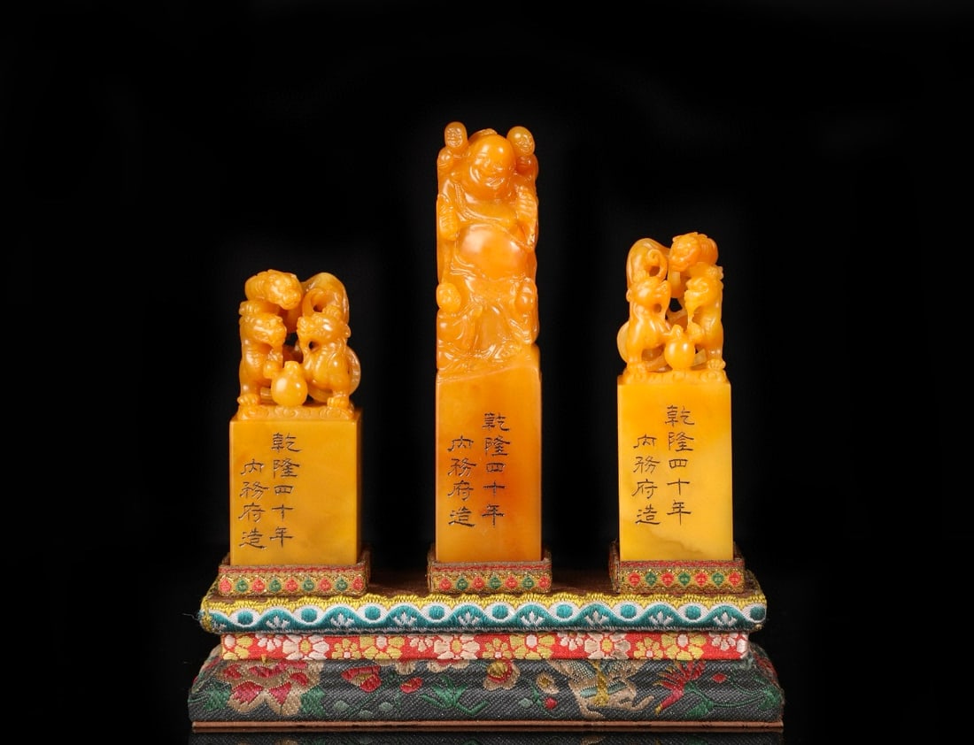 A set of three imperial seals made of Tianhuang stone from the Qianlong period of the Qing Dynasty, (1 of 8)