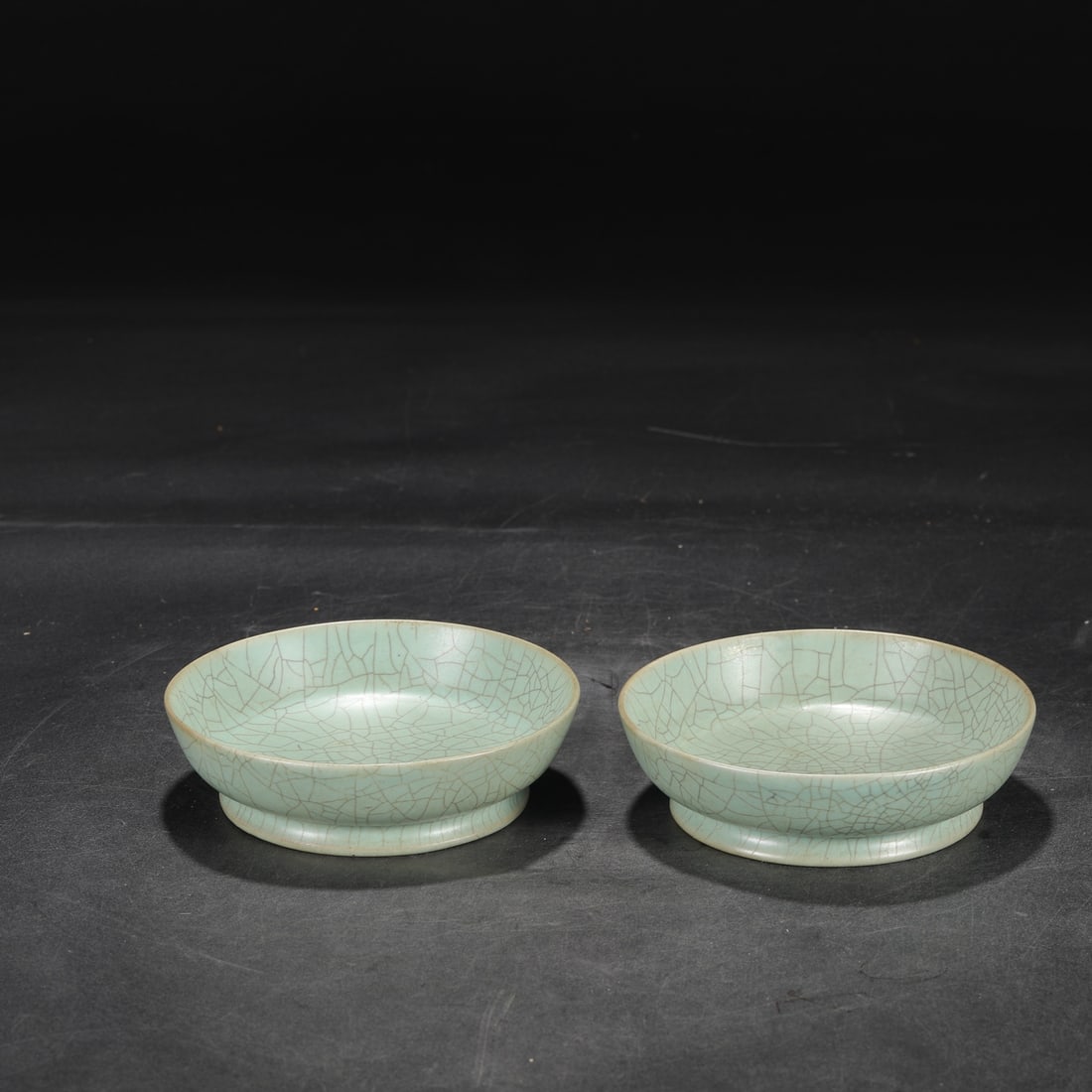 A pair of Northern Song Dynasty Ru ware celadon-glazed imperial round washers, formerly in the (1 of 6)