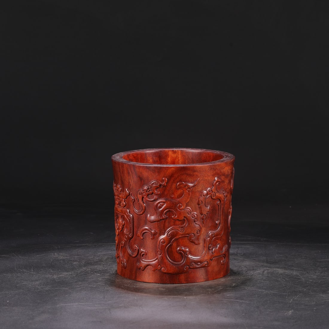 A large brush pot carved from huanghuali wood during the Qianlong period of the Qing Dynasty, (1 of 7)