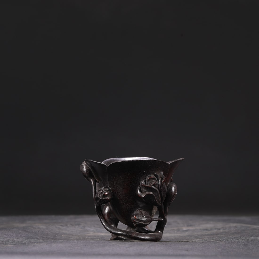 A Qing Dynasty Qianlong period rosewood ear cup, (1 of 6)