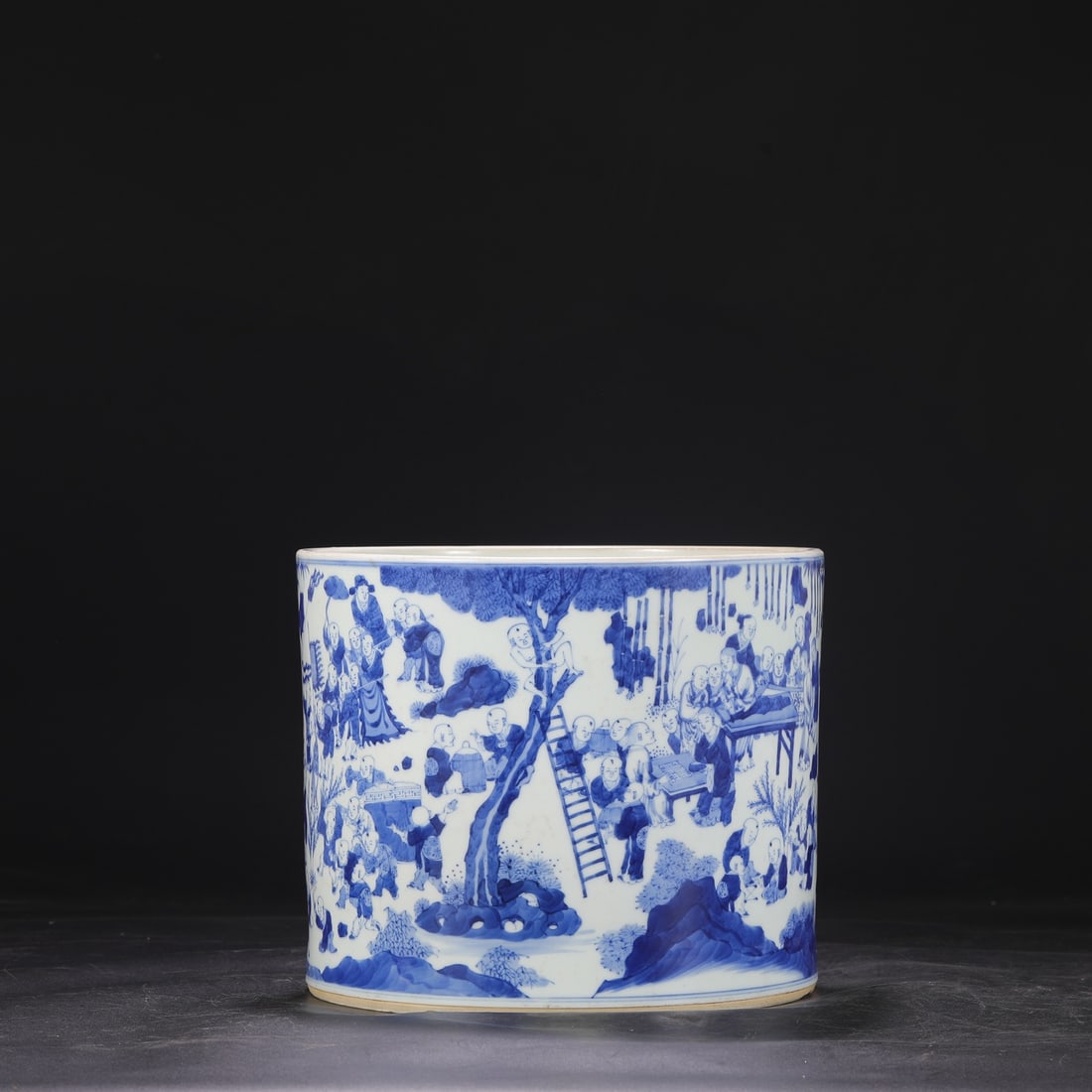 A large blue-and-white porcelain brush pot from the Kangxi period of the Qing Dynasty, formerly in: Dimensions: Height 22.5 cm, Mouth Diameter 27.5 cm.