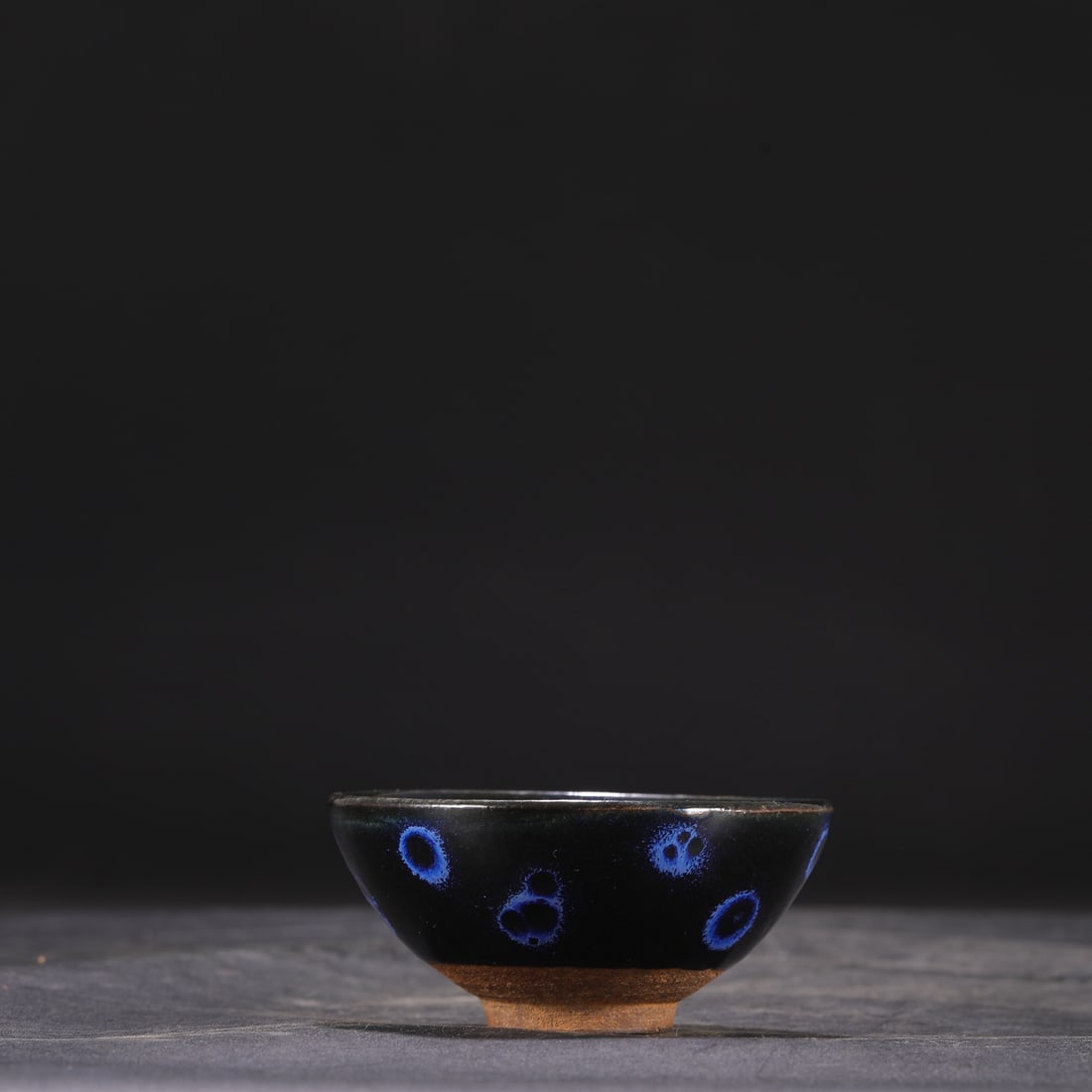 A Northern Song Dynasty Jian ware glazed bowl with a distinctive variegated pattern, formerly in the (1 of 6)