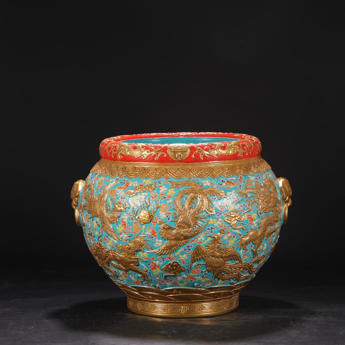 A large Qing Dynasty Qianlong period enamel-painted jar with deep carvings of dragons and phoenixes (1 of 8)