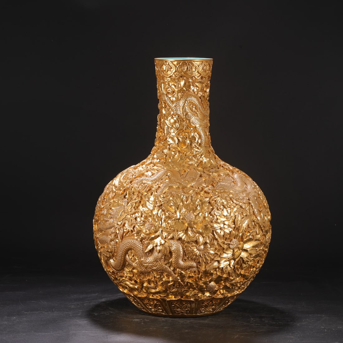 A large celestial globe vase from the Qianlong period of the Qing Dynasty, deeply carved with floral (1 of 8)