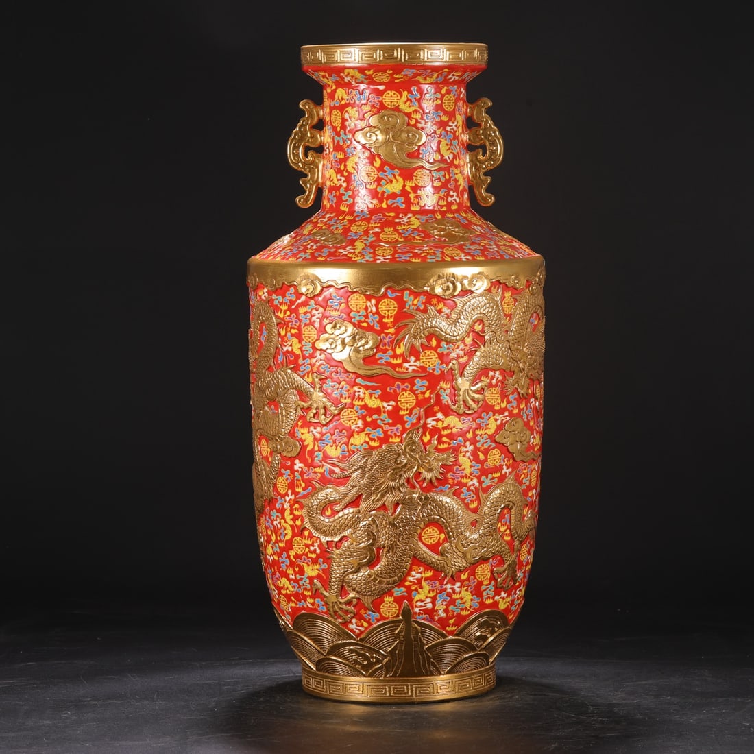 A large Qing Dynasty Qianlong period enamel-painted vase with deep carving of sea dragons and waves, (1 of 8)