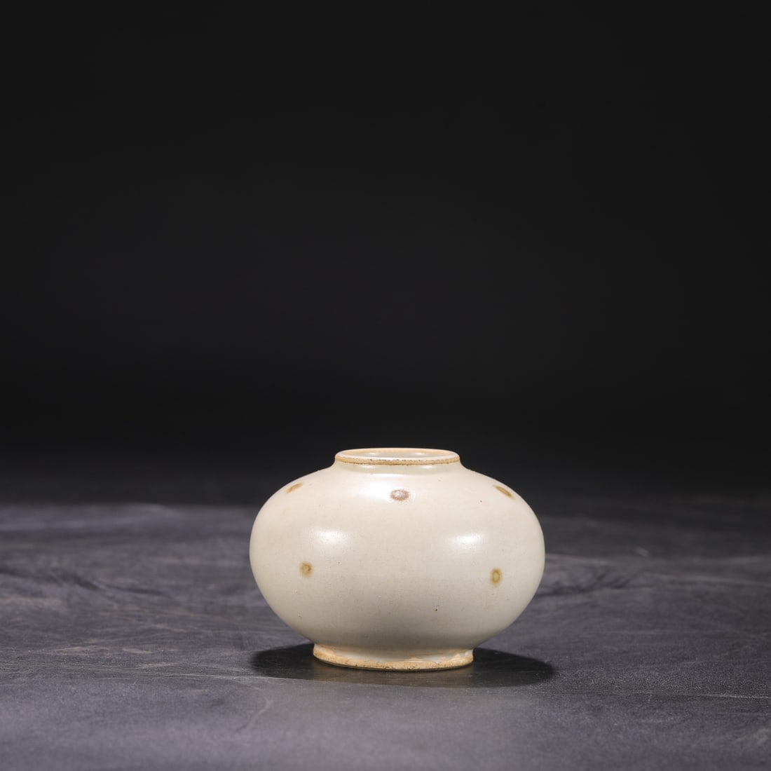 A Tang Dynasty Xing kiln white-glazed water dropper with polychrome decoration, formerly in the (1 of 6)