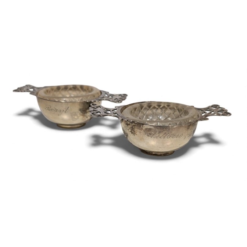 English Early 20th century Pair of silver and crystal salt cellars: Pair of silver salt cellars by Martin Hall & Co Ltd, Sheffield 1912, with crystal interiorsOrigin: EnglandPeriod: Early 20th centuryMaterials: SilverDimensions: Ht 3 x 9 x 5 cm