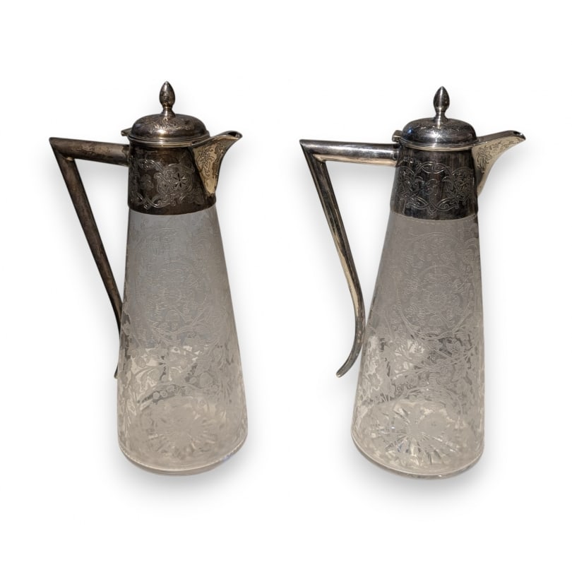 English Early 19th century Pair of engraved glass and silver decanters: Pair of engraved glass and silver decanters by Walker & Hall, Scheffield 1901Origin: EnglandPeriod: Early 19th centuryMaterials: SilverDimensions: Ht 30 x 17 x 10.5 cm