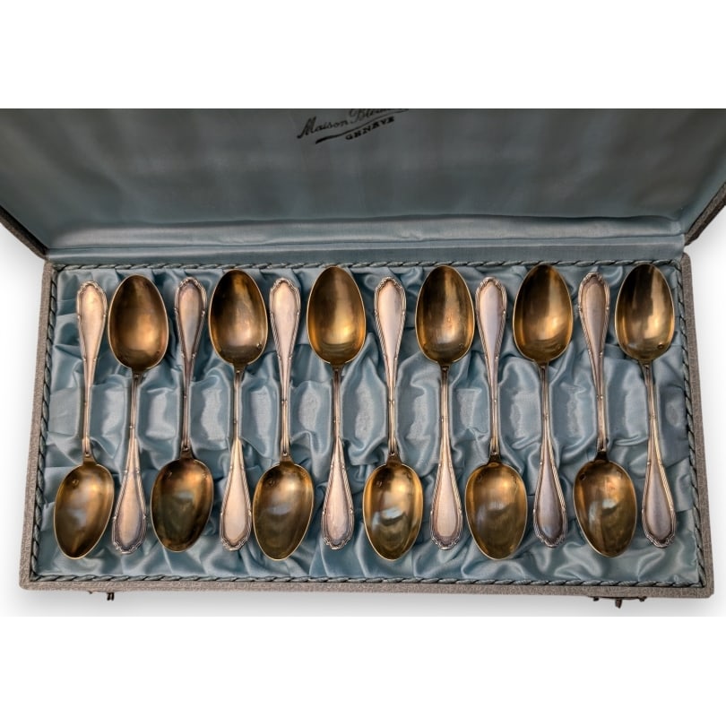 French 19th centurySet of 12 silver spoons by RAVINET et cie: Set of 12 silver spoons by RAVINET & Co., monogrammed ADOrigin: FrancePeriod: 19th centuryMaterials: SilverDimensions: Ht 4 x 28 x 15 cm