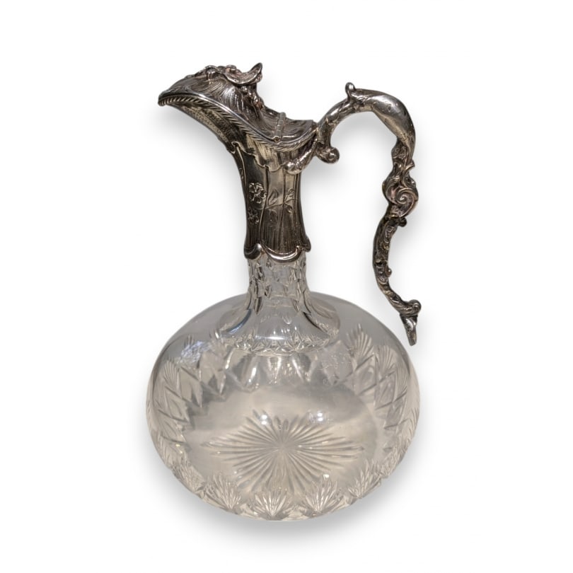 French Cut crystal decanter with silver mount by Auguste Leroy: Cut crystal decanter with silver mount by Auguste LeroyOrigin: FrancePeriod: 20th centuryMaterials: SilverDimensions: Height 22 x Diameter 14 cm
