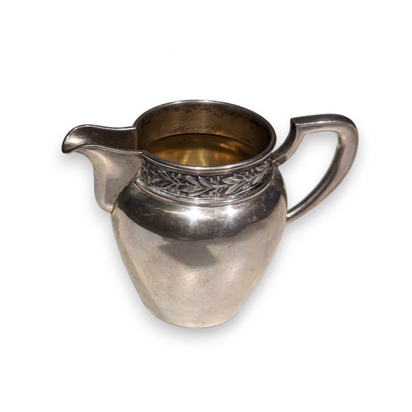 Swiss 20th century Jezler silver 800 laurel pattern creamer: Jezler 800 silver creamer, laurel pattern 3134,86gOrigin: SwitzerlandPeriod: 20th centuryMaterials: SilverDimensions: Ht 7.5 x 10 x 6 cm