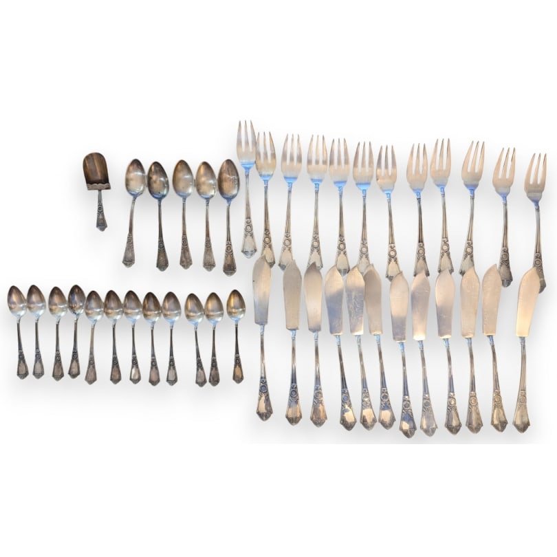 Swiss 20th century Jezler "Empire" Housekeeping Set: Part of the "Empire" cutlery set by JEZLER- 12 fish forks- 12 fish knives- 5 gourmet spoons- 12 mocha spoons- 1 sugar spoon1293gOrigin: SwitzerlandPeriod: 20th centuryMaterials: SilverDimensions: Ht 2
