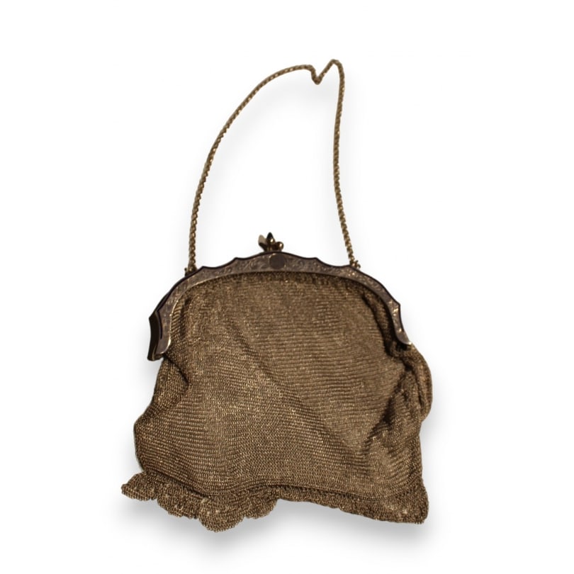 Swiss 20th century Silver bag with enamel decoration: Silver bag with enamel decoration,164gOrigin: SwitzerlandPeriod: 20th centuryMaterials: SilverDimensions: Ht 16 x 14 x 1 cm