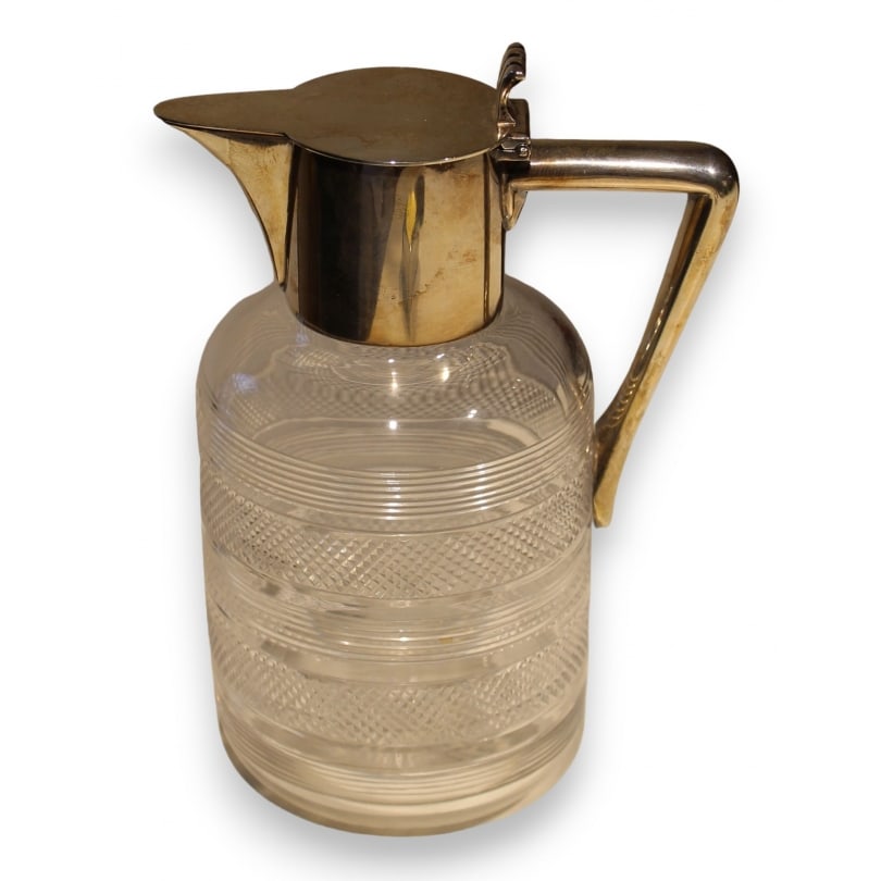 English 19th century Crystal and silver pitcher: Crystal and silver pitcher by Heath & Middleton, Birmingham, 1895Origin: EnglandPeriod: 19th centuryMaterials: SilverDimensions: Ht 16 x 12 x 8 cm