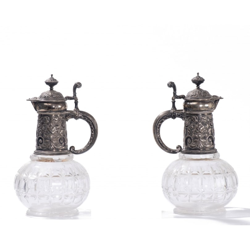 German Early 20th century Pair of cut crystal wine decanters by Koch & Bergfeld: Pair of cut crystal wine decanters with handle, neck, spout and lid in German sterling silver .925 by Koch & Bergfeld no. 13160Origin: GermanyPeriod: Early 20th centuryMaterials: SilverDimensions: Hei