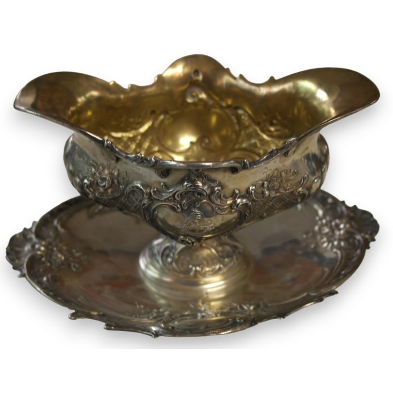 German 19th century Silver rocaille sauce boat: Rococo silver sauce boat with EG initials and coat of armsOrigin: GermanyPeriod: 19th centuryMaterials: SilverDimensions: Ht 10 x 23 x 16 cm