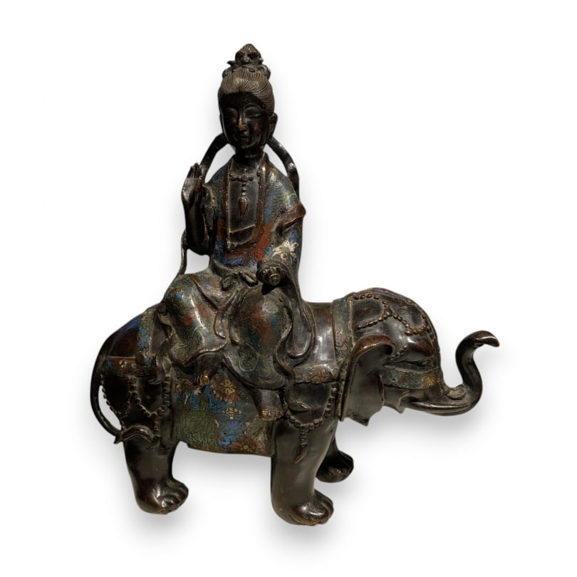 19th century Cloisonné bronze Kannon on an elephant: Cloisonné bronze Kannon in a pose of royal relaxation on an elephantOrigin: JapanPeriod: 19th centuryMaterials: BronzeDimensions: Ht 43 x 37 x 18 cm