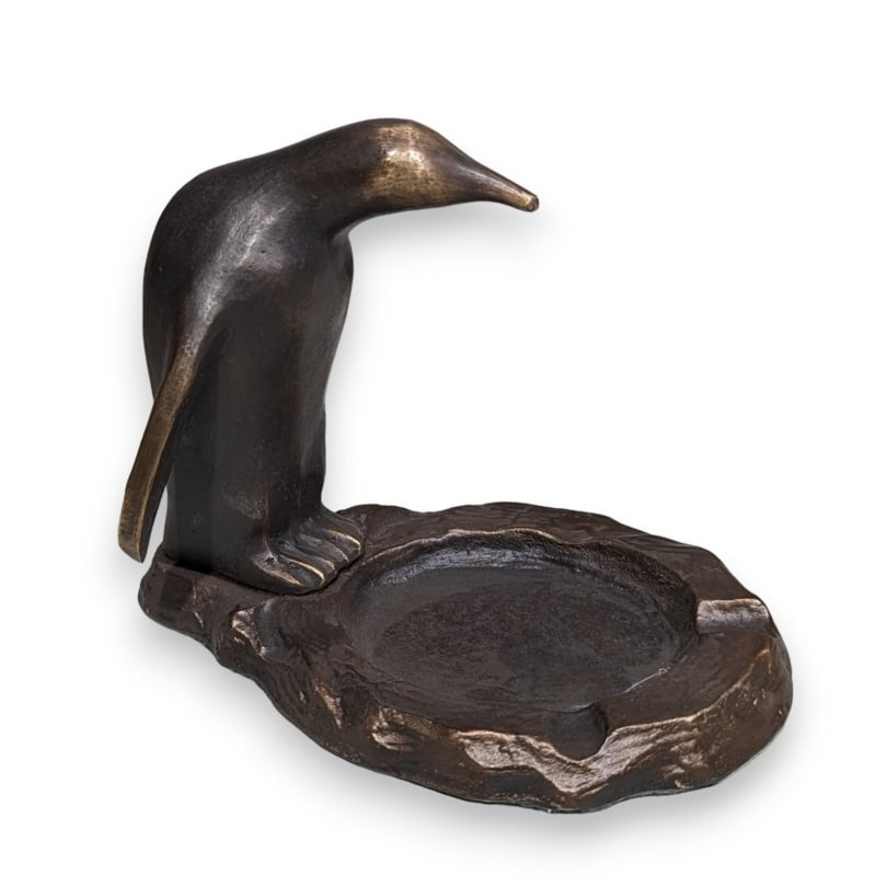 Swiss Bronze Penguin Ashtray: Bronze Penguin Ashtray,LEUBA FoundryOrigin: SwitzerlandPeriod: 20th centuryMaterials: BronzeDimensions: Ht 11 x 14 x 9 cm