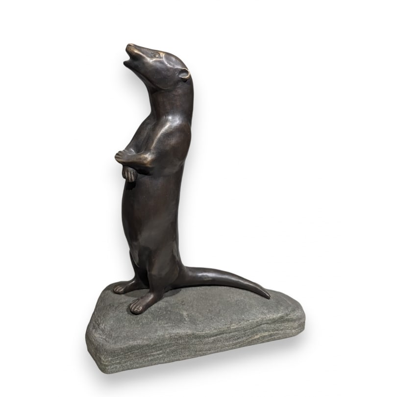 Swiss Standing bronze otter mounted on a stone: Standing bronze otter mounted on a stone, LEUBA Foundry, model by Louis Henri Roger DUCOMMUN (1910-2008)Origin: SwitzerlandPeriod: 20th centuryMaterials: BronzeDimensions: Ht 40 x 30 x 14 cm