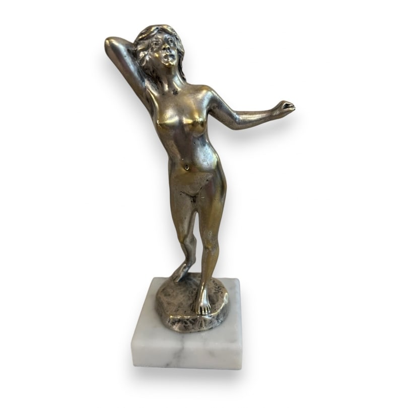 French Radiator cap signed A GARNIER: Silvered bronze radiator cap "Nude Woman" signed A GARNIER with white marble baseOrigin: FrancePeriod: Early 20th centuryMaterials: Silvered bronzeDimensions: Ht 18 x 9 x 6.5 cm