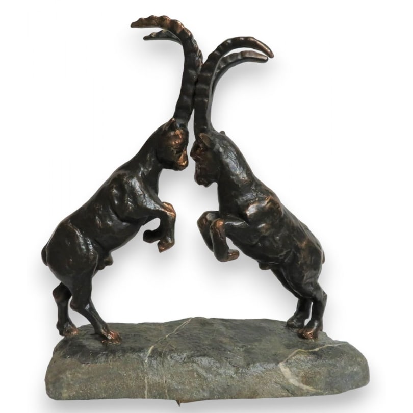 Swiss Bronze Ibex Fight, signed REUSSNER: Bronze sculpture of Ibex in Combat, signed REUSSNER (Charles 1886-1961)Origin: SwitzerlandPeriod: 20th centuryMaterials: BronzeDimensions: Ht 29 x 26 x 12 cm
