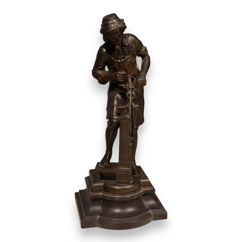 19th century Bronze sculpture "Swordsmith" signed A. ESPIE: Bronze sculpture "The Armorer" signed A. ESPIE, blackened wood baseOrigin: FrancePeriod: 19th centuryMaterials: BronzeDimensions: Ht 44 x 18 x 16 cm