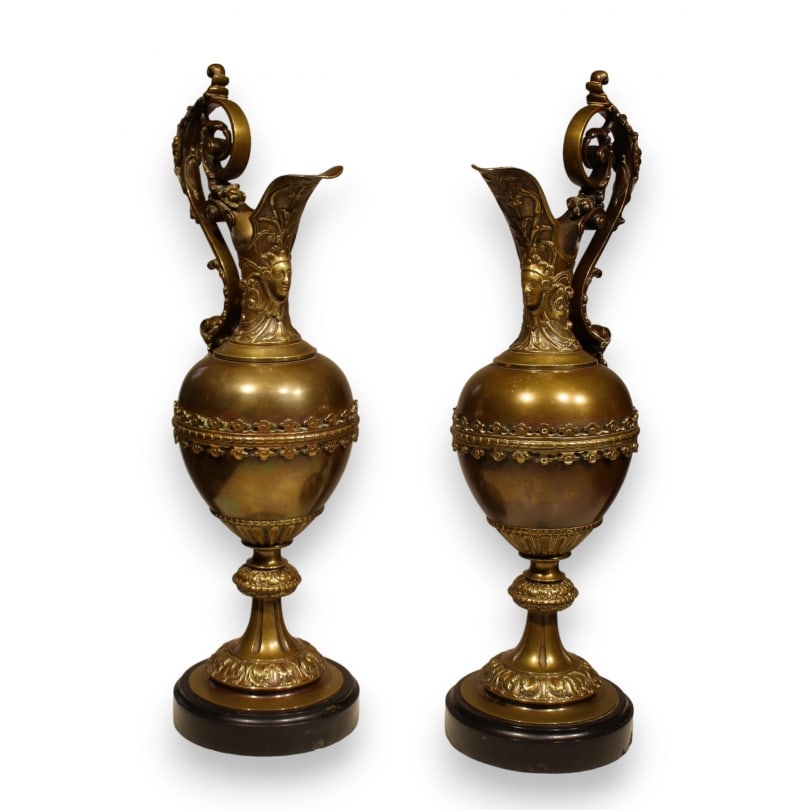 French 19th century Pair of Napoleon III bronze ewers: Pair of Napoleon III bronze ewers, decorated with a woman's face on the body and an old man's face on the handle, round marble baseOrigin: FrancePeriod: 19th centuryMaterials: BronzeDimensions: Ht 55