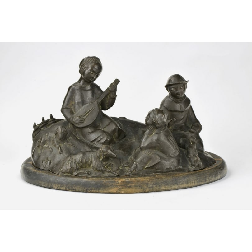 German Bronze group sculpture "Children listening to the mandolin": Bronze group "Children Listening to the Mandolin" monogrammed RCOrigin: GermanyPeriod: 20th centuryMaterials: BronzeDimensions: Ht 28 x 50 x 28 cm