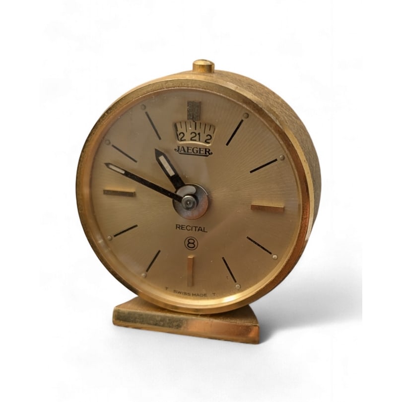 20th century JAEGER Travel Alarm Clock: JAEGER brass travel alarm clock. 8-day movement.101Origin: SwitzerlandPeriod: 20th centuryMaterials: BrassDimensions: Ht 5 x 4.5 x 4 cm