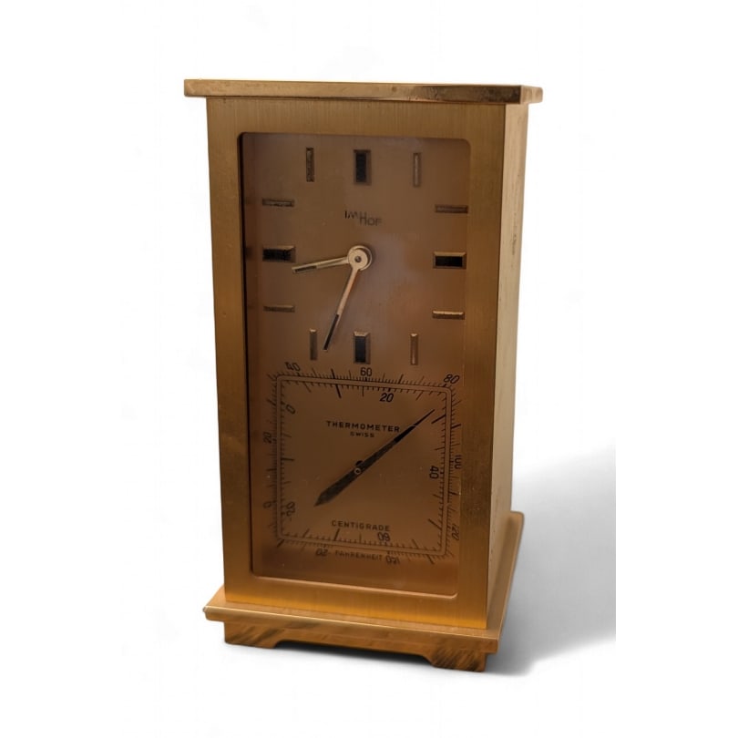 IMHOF double clock with weather station: IMHOF double clock with thermometer and hygrometer437 932Origin: SwitzerlandPeriod: 20th centuryMaterials: BrassDimensions: Ht 10.5 x 5.5 x 5.5 cm