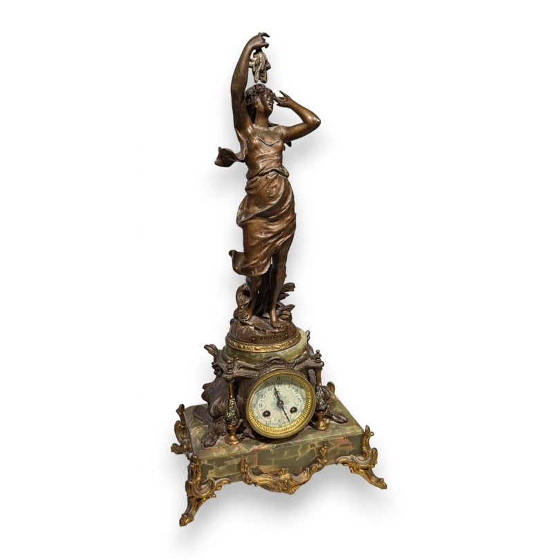 19th century Onyx clock surmounted by "Harvest": Onyx clock surmounted by a spelter sculpture "Harvest" by J. BERTHOZ, cloisonné columnsOrigin: FrancePeriod: 19th centuryMaterials: SpelterDimensions: Ht 62 x 30 x 20 cm