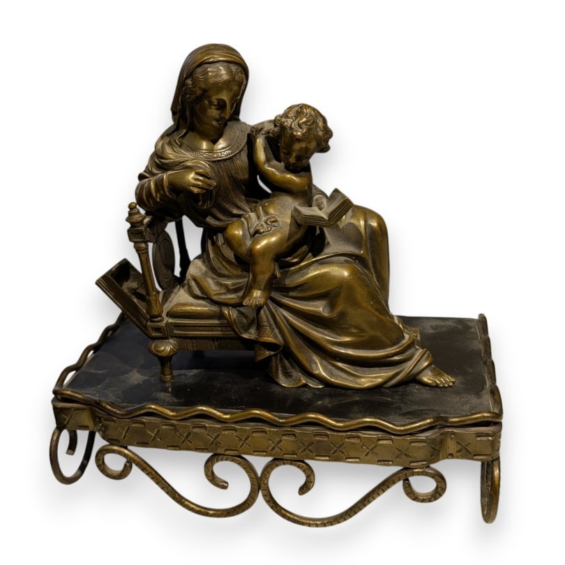 French 19th century Bronze clock top "Reading": Bronze clock top "Reading", on a black marble plaqueOrigin: FrancePeriod: 19th centuryMaterials: BronzeDimensions: Ht 26 x 25 x 15 cm