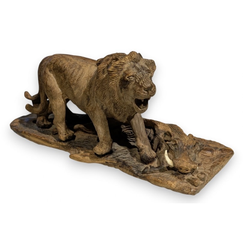 Sculpture "Lions and Warthog" signed B. MAKENA: Sculpture "Lions and Warthog" signed B. MAKENAOrigin: AfricaPeriod: 20th centuryMaterials: Carved woodDimensions: Ht 14 x 34 x 17 cm
