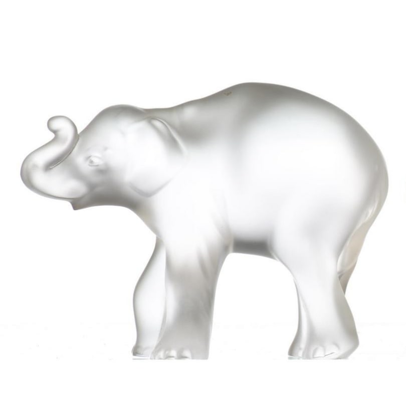 Glass sculpture "Baby Elephant" Signed LALIQUE: "Elephant Timora" sculpture in pressed satin-finish molded glass. Signed "Lalique France" under the base.Provenance:Catherine Clerc-De Goumoëns CollectionOrigin: FrancePeriod: 20th centuryMaterials: