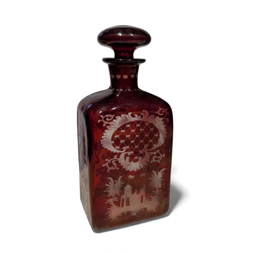 Red glass bottle engraved with Bohemian motifs: Red glass bottle engraved with Bohemian motifsOrigin: CzechoslovakiaPeriod: 20th centuryMaterials: GlassDimensions: Ht 20 x 10 x 7 cm