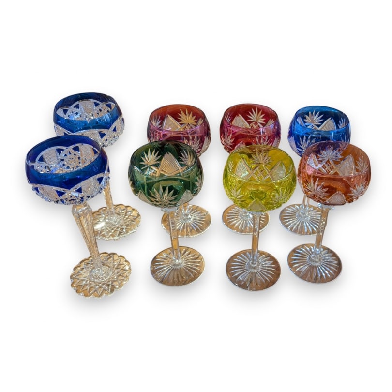 German Set of 6 Rhine crystal glasses: A set of six colored crystal glasses from the Rhine by Nachtmann, along with two blue Saarbrücken crystal glasses from Val St Lambert.Origin: GermanyPeriod: 20th centuryMaterials: CrystalDimensions: