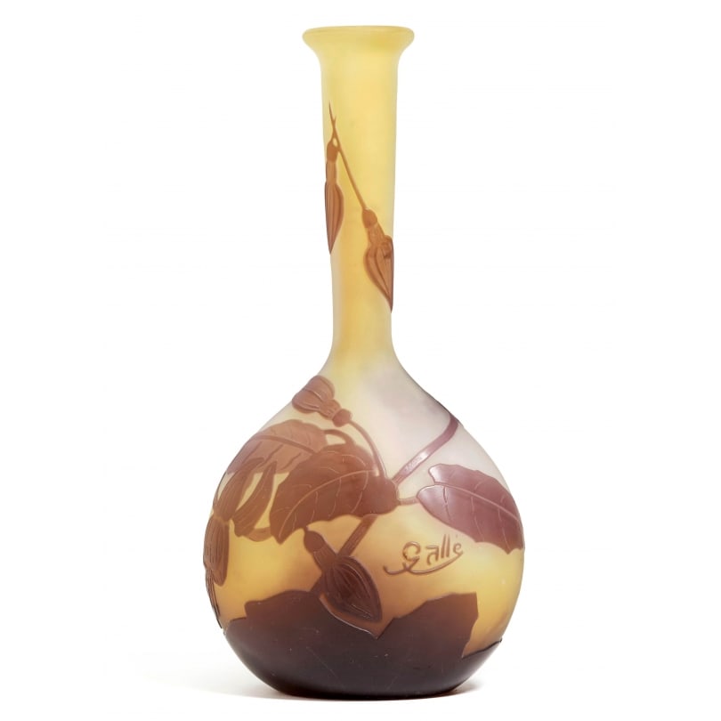 Fuchsia soliflore vase signed GALLÉ: A multi-layered glass soliflore vase signed GALLÉ, decorated with fuchsia and purple flowers on a yellow background.Origin: FrancePeriod: 20th centuryMaterials: GlassDimensions: Ht 17 x 8 x 6 cm