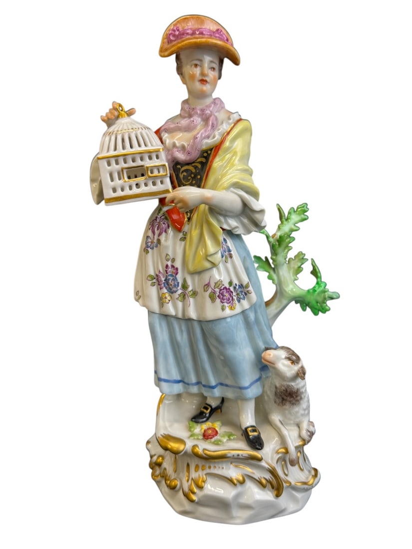 Meissen - Porcelain shepherdess figure with birdcage: Meissen porcelain figure, shepherdess with birdcage (Schäferin mit Vogelkäfig) from a series of 10 figurines. Model created by Johann Joachim Kaendler around 1750. Marked with blue crossed swords an