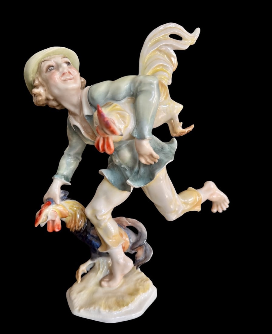 Hutschenreuther - Porcelain figurine "The Chicken Thief" by Karl Tutter: Hutschenreuther porcelain figurine "The Chicken Thief" by Karl Tutter (der hühnerdieb), depicting a chicken thief on the run, with an amused and mischievous expression, painted in delicate, transluce