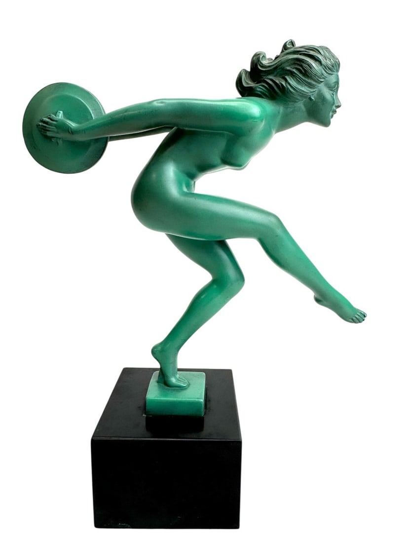 Garcia for Max Le Verrier Art Deco Dancer - Joy: Art Deco figure entitled "Joy" in the form of an art font depicting a dancer with green patinated discs on a black marble base, signed Garcia - Editions Max Le Verrier. In very good condition, with a