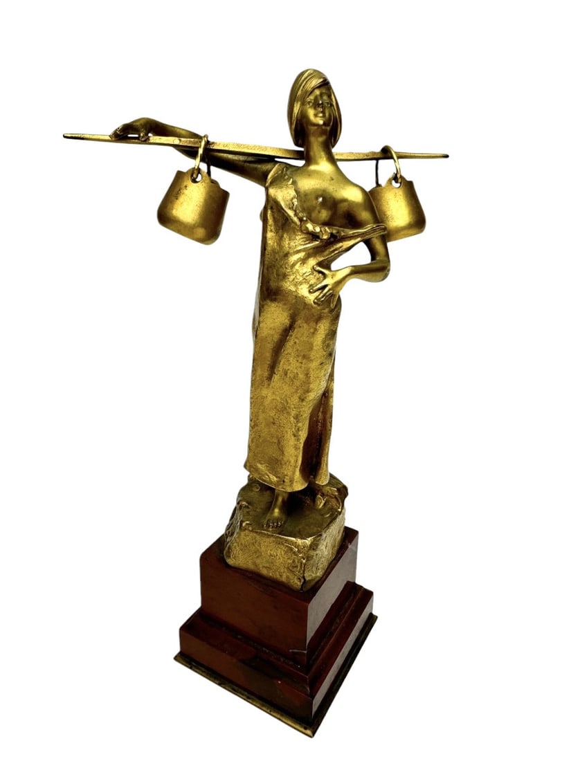 A. Moncel Bronze Water Carrier: "A. Moncel Bronze Water Carrier"Gilt bronze sculpture "Water Carrier" signed A. Moncel and dated 1897 on the base, with the foundry mark of Ferdinand Barbedienne in Paris. The sculpture rests on a vei