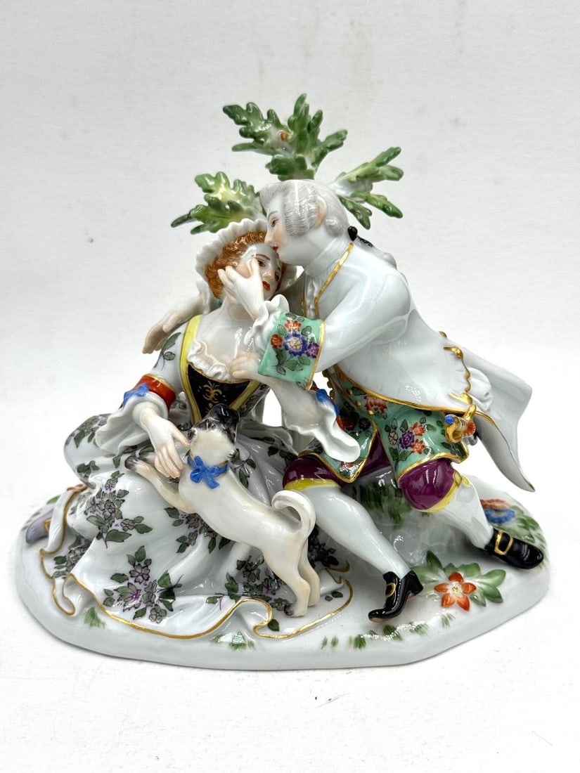 Meissen - Porcelain Group of a Couple with a Dog: Meissen porcelain group, couple with a dog under a tree (Liebesgruppe mit Baum). Model created by Johann Joachim Kaendler in 1745. Marked with blue crossed swords and numbered 73097. In very good cond