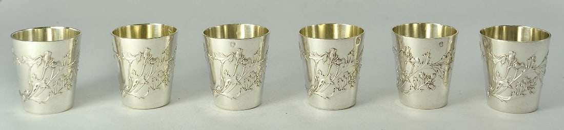 Art Nouveau. Six Silver Liqueur cups, France, Circa 1900: Art Nouveau.Set of six silver liqueur/vodka glasses with flat bottoms, baluster shape slightly widened at the top, thistle-decorated body.950/1000 silver, Minerva hallmarks. Maker's mark: Boulenger, /